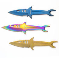 Three shark throwing knives inhabit the included belt sheath, blue, gold, and rainbow, with gills, fins, tail, and serrated teeth