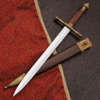 Bramham Moor Medieval Dagger by Windlass has high carbon steel blade, matte brass fittings and leather scabbard with lion's head
