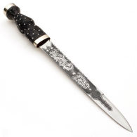 Scottish dirk has sharp 1055 high carbon steel blade etched on both sides with foliage and thistle motif, includes leather sheath