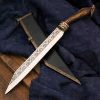 Royal Stag Seax has engraved, sharpened high carbon steel blade, brass guard with Nordic relief and Sambar Stag handle