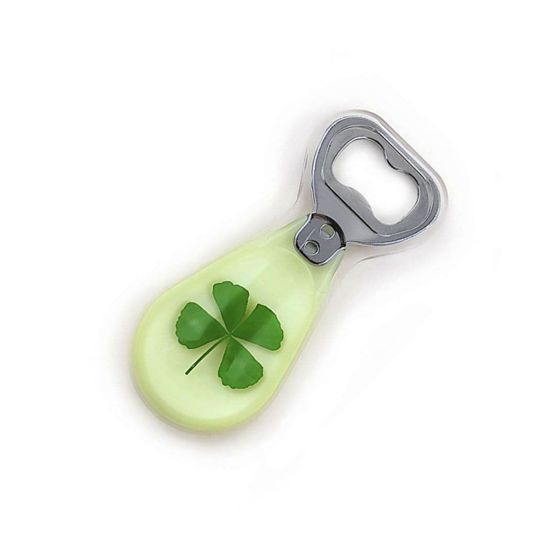 glow in the dark bottle opener with a real four-leaf clover encased in jewelry quality acrylic and a magnetic insert