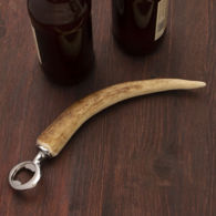 handcrafted antler bottle opener for hunting cabin or kitchen, gently curving stag horn, approximately 9" long overall