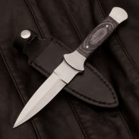 solid stainless steel full tang blackwood boot dagger with layered resin scales, leather sheath with metal clip