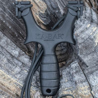 light and compact KA-BAR Sweet Move Slingshot perfect for backyard and camping, includes latex bands and leather ammo pouch