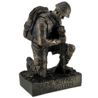 Kneeling soldier statue is resin with bronze finish, a fitting tribute for those who have lost loved ones in the service