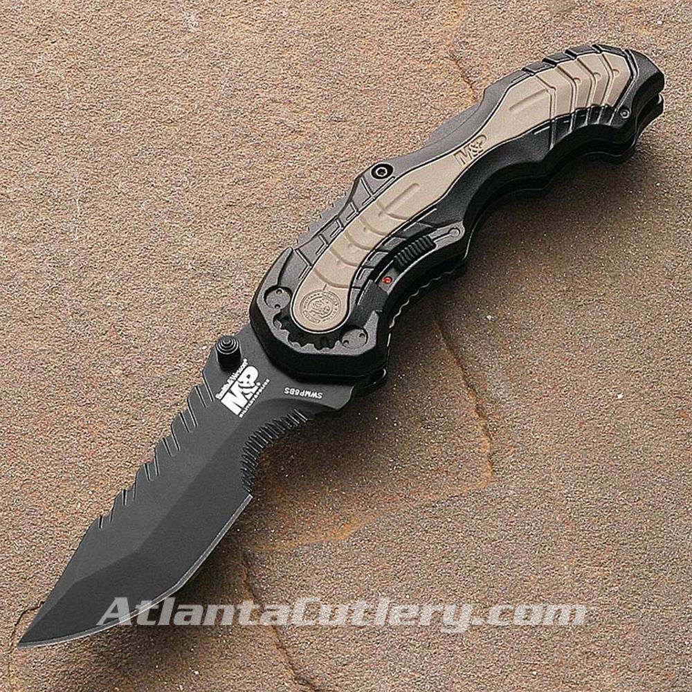 Picture of S&W Black Handle Grey Rubber Inlay Semi Serrated