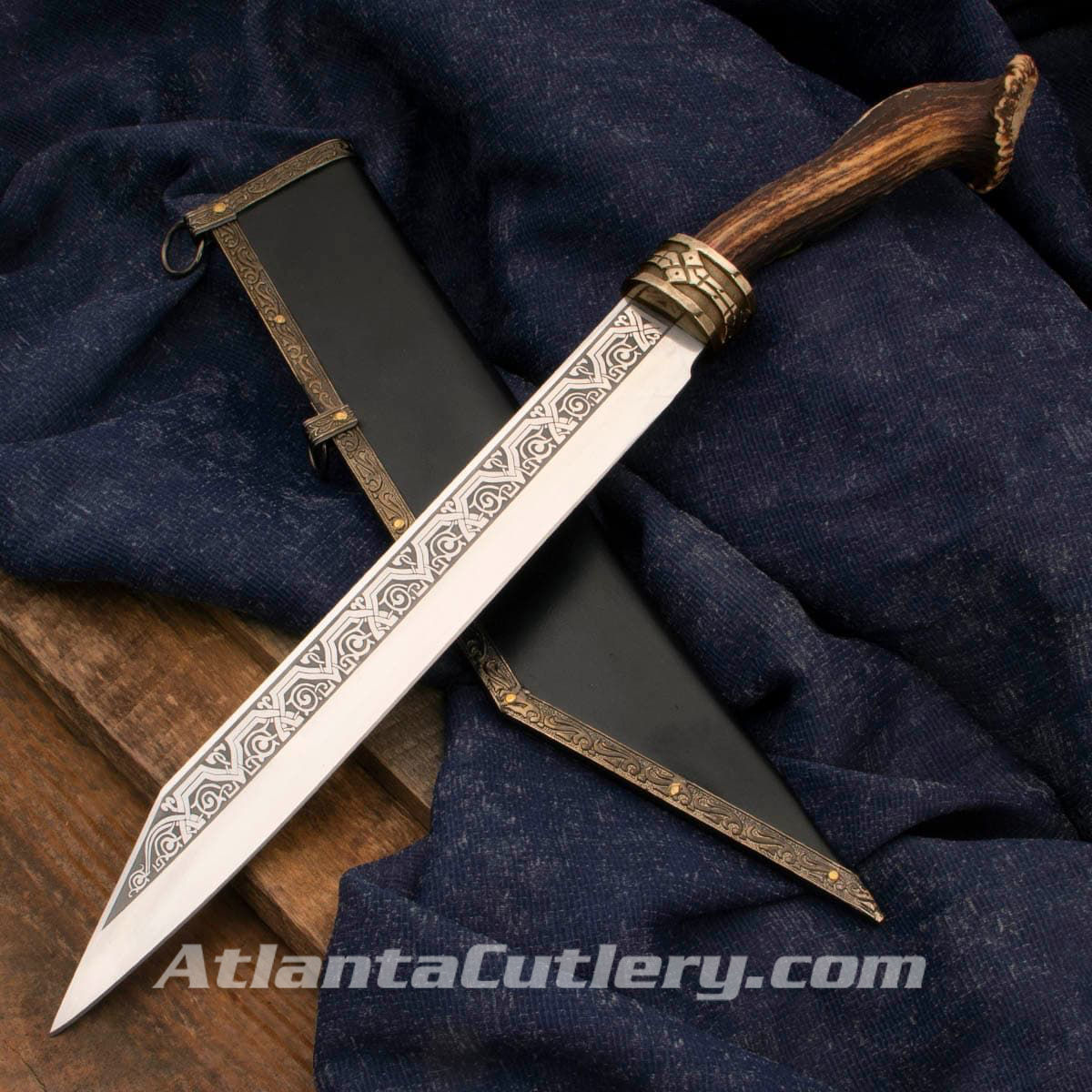 Royal Stag Seax has engraved, sharpened high carbon steel blade, brass guard with Nordic relief and Sambar Stag handle