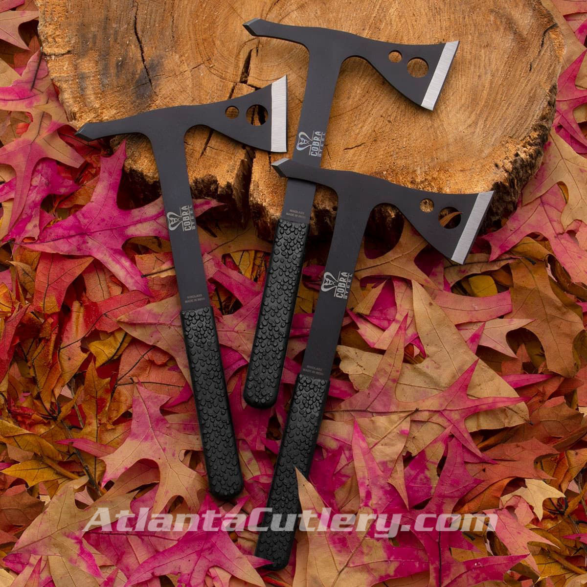 set of 3 Cobra Steel throwing axes are one piece of high carbon steel with sharpened backspikes and textured rubber grips