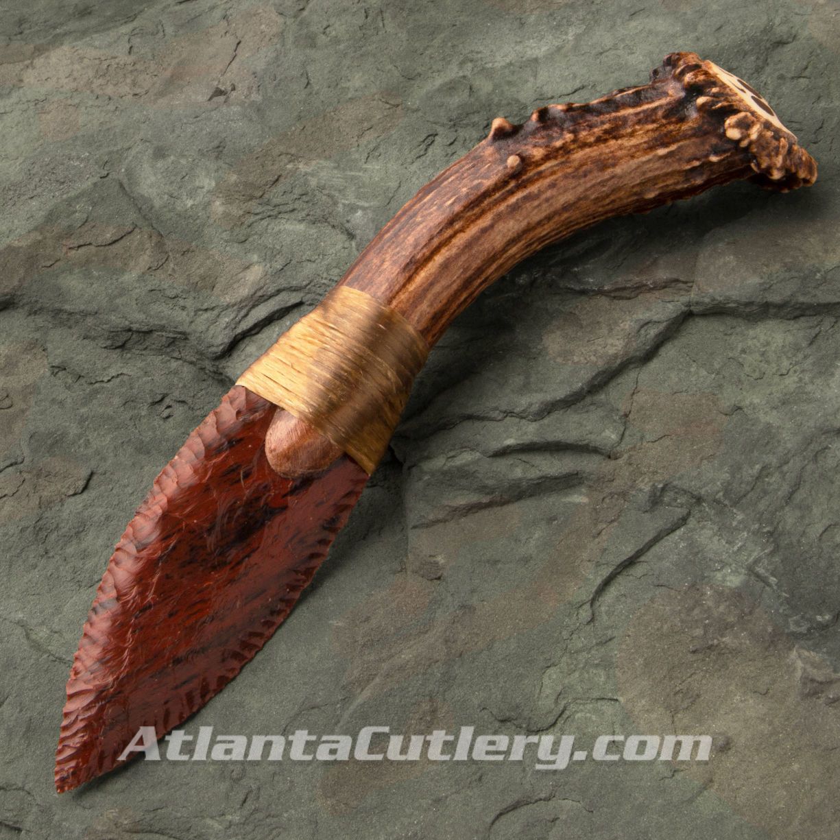 hand-knapped Leaf Blade knife made in the USA with obsidian blade, stag crown and bound with sinew, includes antler stand