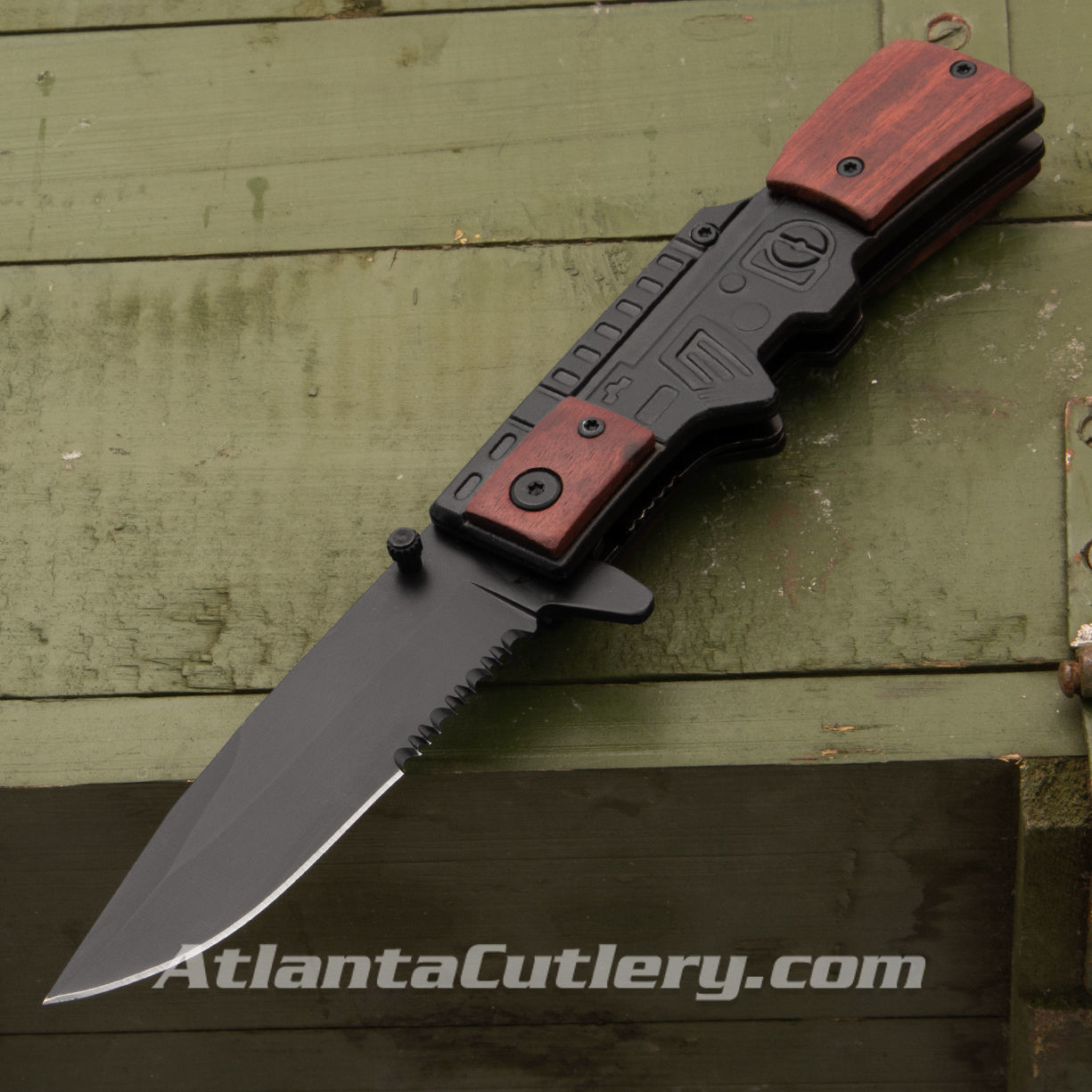 folding knife with AK47 style wood handle, blackened stainless steel blade, one hand opening with "trigger" integral thump flipper 