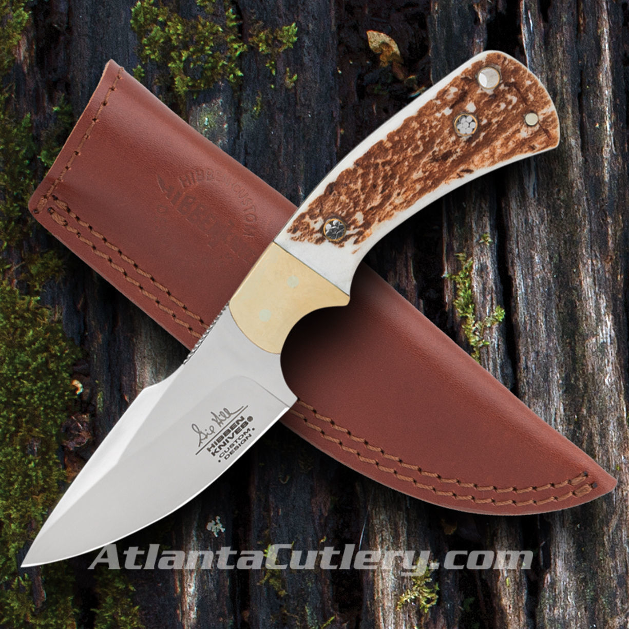Gil Hibben knife for hard everyday use has stag scales, full tang blade with brass liner, includes leather belt sheath