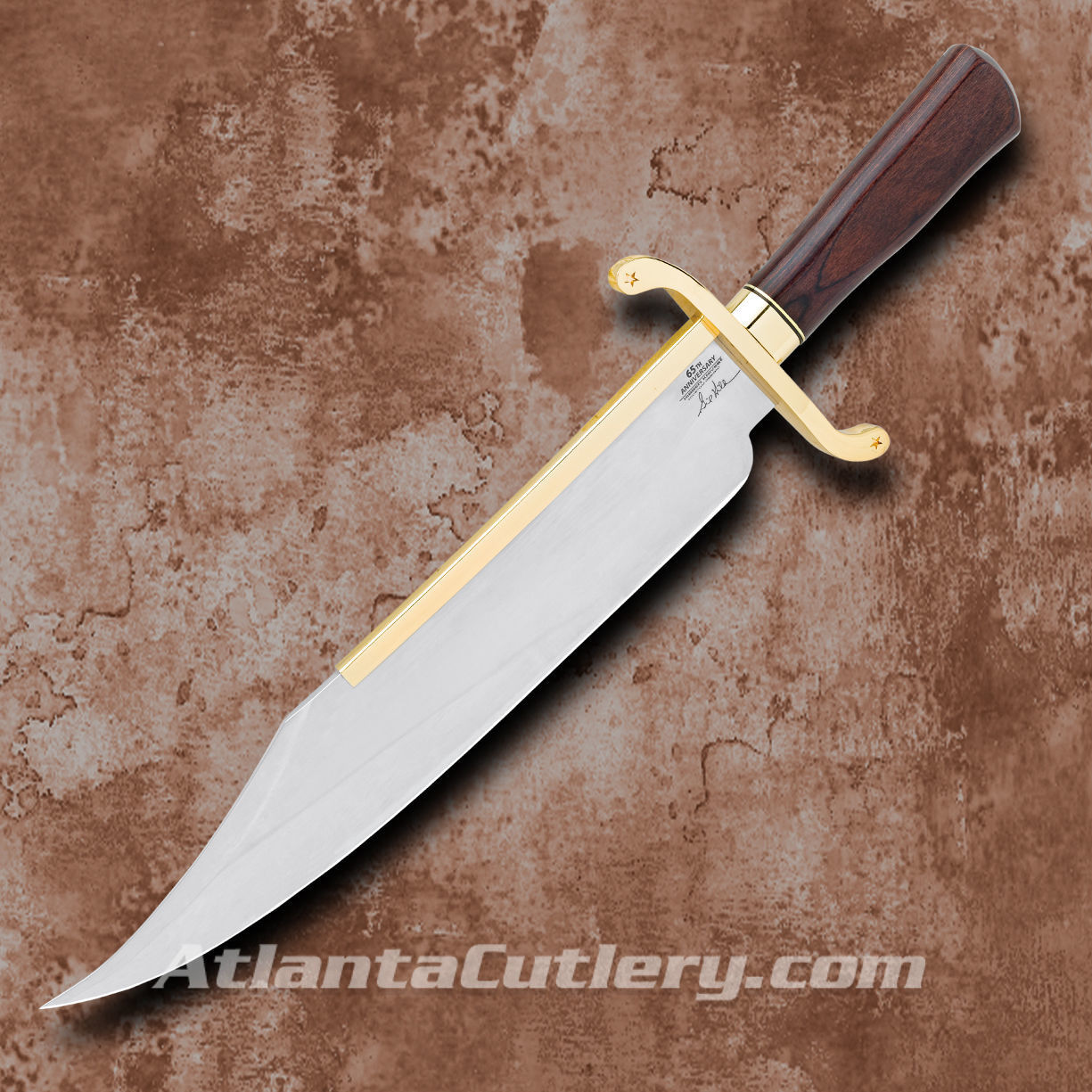 Gil Hibben 65th Anniversary Old West Bowie Knife has stainless steel clip point blade, gold-plated blade catcher, leather sheath