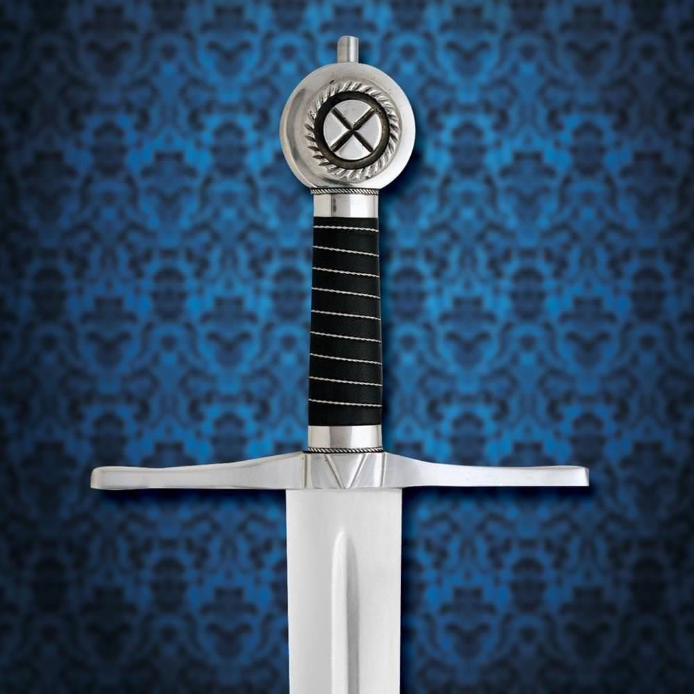 The pommel on the Robert the Bruce sword has Cross of St. Andrew, grip is black leather with a silver chain wrap