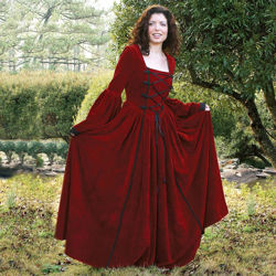 This red 100% cotton velvet medieval dress has full bell sleeves and a full skirt. Matching handmade frogs compliment the black lace-up bodice