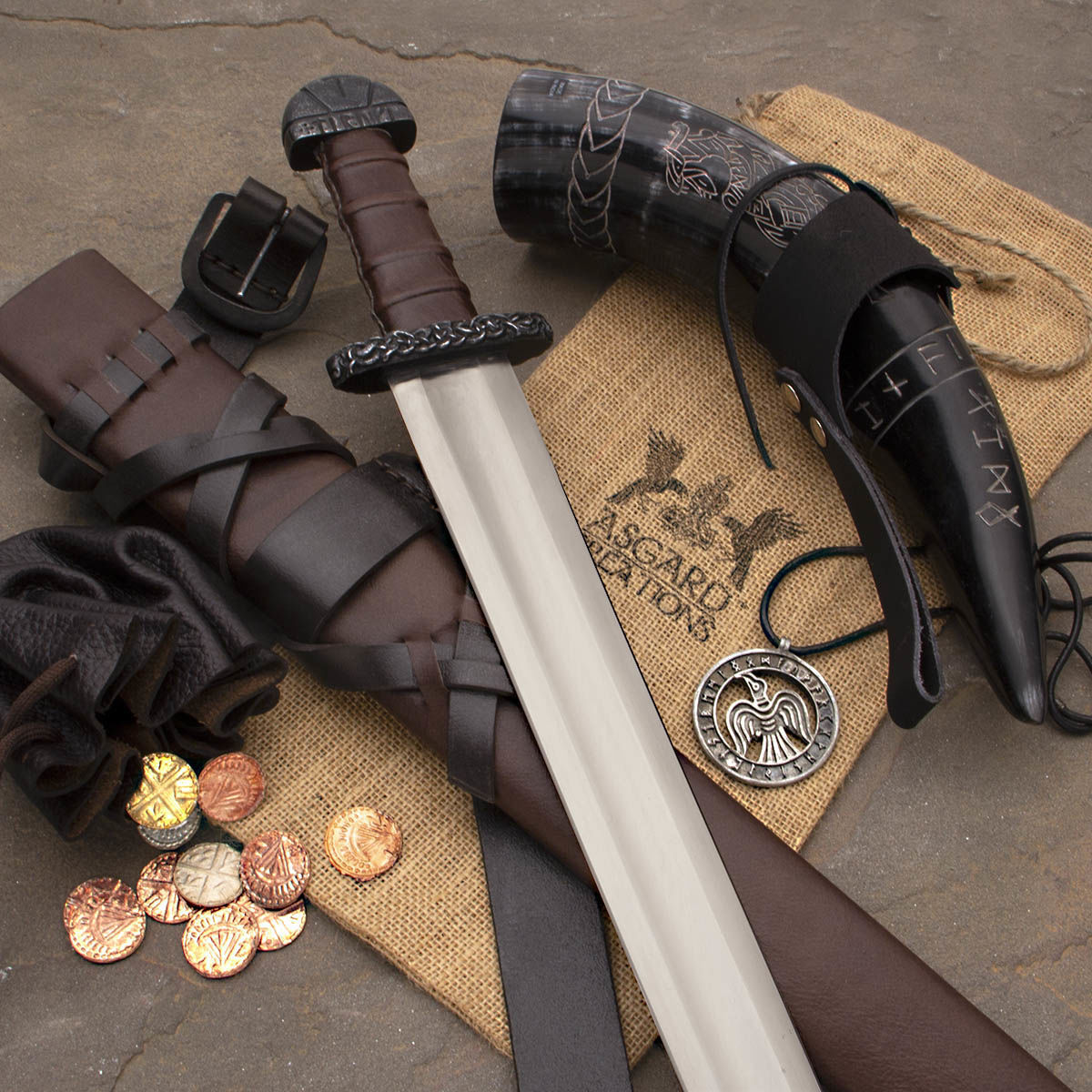 The Viking Explorer Box with Sword, leather belt and scabbard, drinking horn with frog, leather pouch with coins and a pewter raven necklace