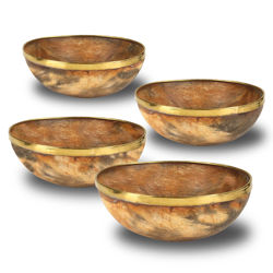 Set of 4 natural horn feasting bowls have a brass rim. Approximately 5” in diameter each.