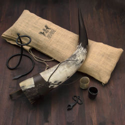Oversized Drinking Horn includes stand, Bottle Opener, holster, jute carry bag, shot glasses and iron bottle opener