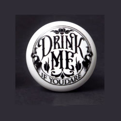 Drink Me If You Dare cork stopper with ceramic top inviting you to partake, if you dare