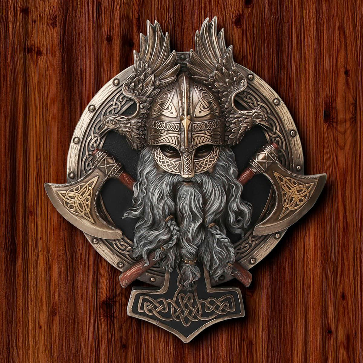 cold cast bronze wall plaque of helmeted Viking berserker with crossed axes and Thor's Hammer, mounted atop a shield