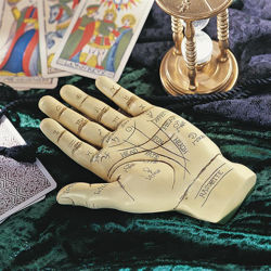 bone-colored resin Palmistry Hand Sculpture inscribed with planetary and zodiac symbols, includes booklet and option to hang