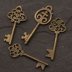 set of 4 ornate Monastery Keys range in size from 3-3/4" to  4-1/4", each with a beautiful antique brass finish