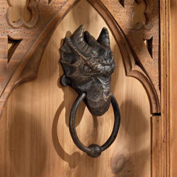 Dragon Head Iron Door Knocker fashioned in sand cast method to capture detail, then crafted in aged iron 