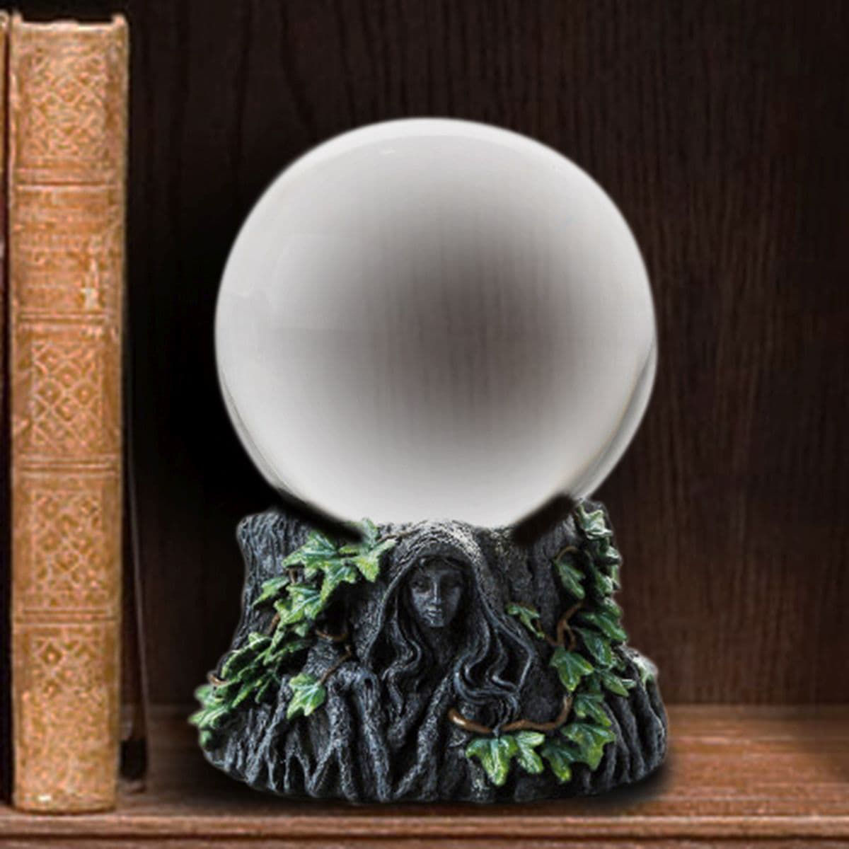 Triple Goddess Gazing Ball rests atop a finely detailed cold cast resin base depicting Maiden, mother and crone 