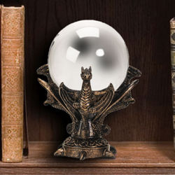 Dragon Gazing Crystal Ball rests in wings of dragons in a hand-painted cold-cast resin stand with Celtic knotwork 
