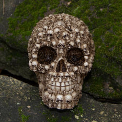 Cost cast resin Boneyard skull of skulls,  along with ribs, femurs, and spines, roughly 3/4 scale skull is hand stained 