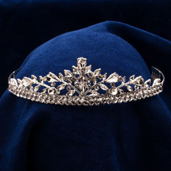 beautiful tiara with double row of rhinestones topped with sprays of various-sized pearl and oval-shaped jewels and side combs