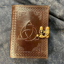 Trinity Knot Leather Journal bound with 120 pages of handmade parchment paper and working antiqued brass latch for closure