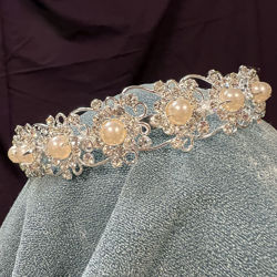 rhinestones in Lady In Waiting Coronet crown create elegant flowers connected with scrolling silver wire 
