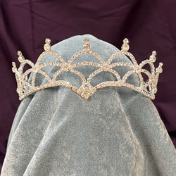 Princess Crown has sparkling rhinestones, with a larger jewel at the forehead and gentle arcs of rhinestones along top