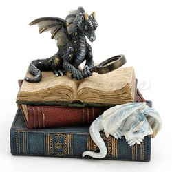 polyresin Dragon Scholars Trinket Box with 2 dragons atop a stack of books, one with magnifying glass, the other relazing