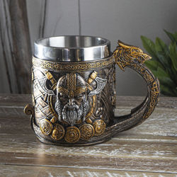 cold-cast resin Viking Longship Mug is hand painted with axes and knotwork to look like metal, stainless steel insert inside