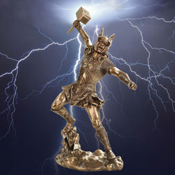 cold cast resin statue of Thor, the Norse God of Thunder, raising his hammer